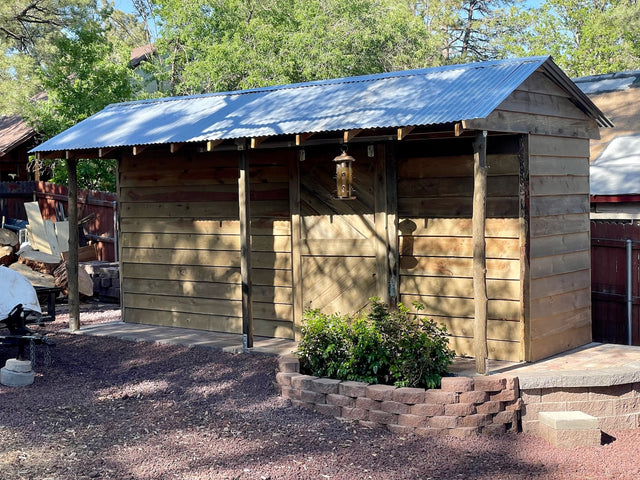 Wood Storage Shed Treated with Non-Toxic Tall Earth Treatment